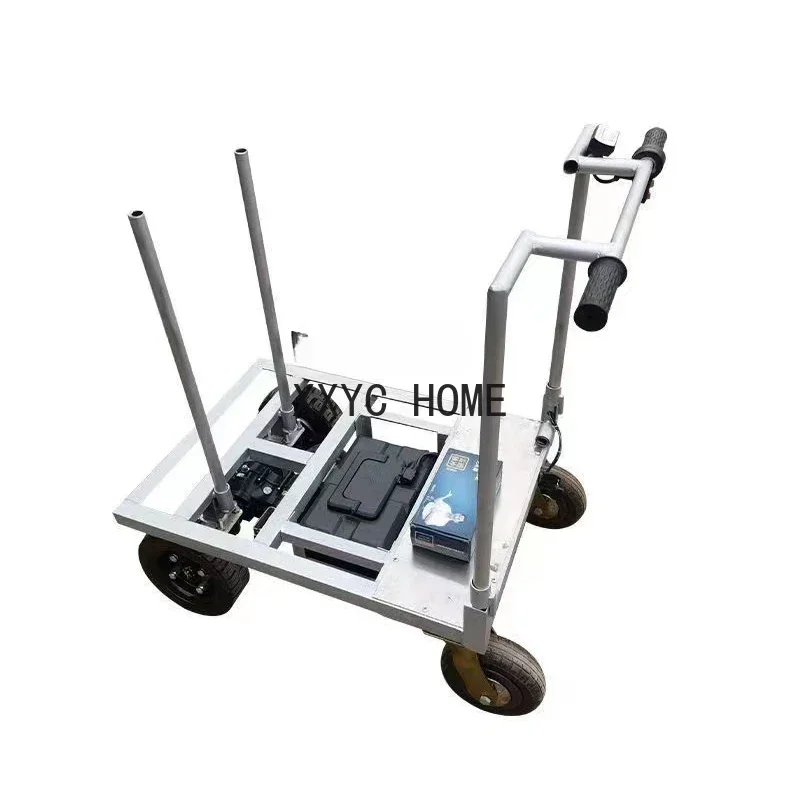 Carrello di carico elettrico Tirare il carico nell'ascensore Spinta a mano Carrello portatile con piattaforma di movimentazione a quattro ruote