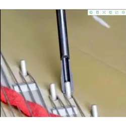 Strike the string tool at the piano peg to eliminate noise