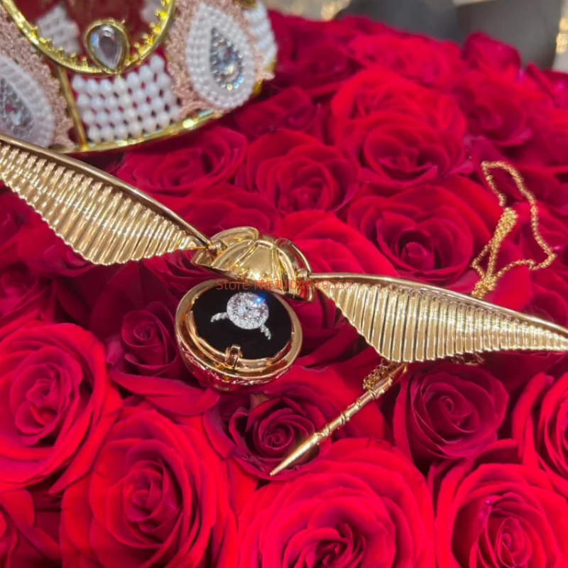 Caja de anillos de cerilla dorada, caja de anillos de cerilla dorada con alas giratorias, joyero de Metal chapado en oro de primera calidad para compromiso de propuesta