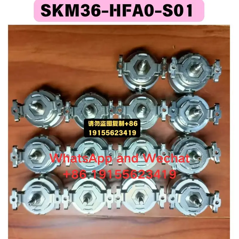 Used OEM disassembled parts SKM36-HFA0-S01 encoder Functional test OK Quick delivery
