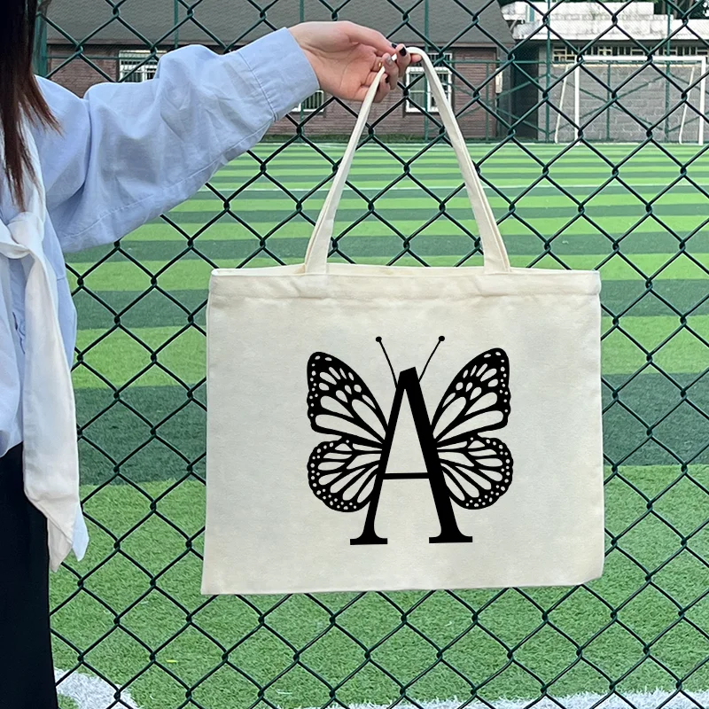 

2022 New Butterfly Letters Shoulder Shopping Canvas Bag Horizontal Version With Zipper Large Capacity All-match Handbag Summer