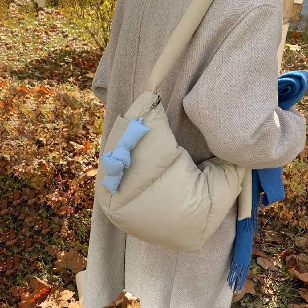 

Japanese Style Down Cotton Dumpling Bag Sweet Solid Color Puffer Cloud Shoulder Bag with Pendant Padded Nylon Quilted Handbag