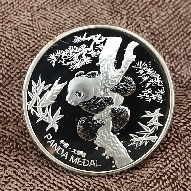 Panda Climb Tree Commemorative Coin