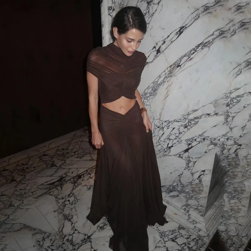 Europeo americano sexy moda estiva vita alta tinta unita maglia borsa pieghettata glutei ombelico esposto abito lungo abbigliamento da donna