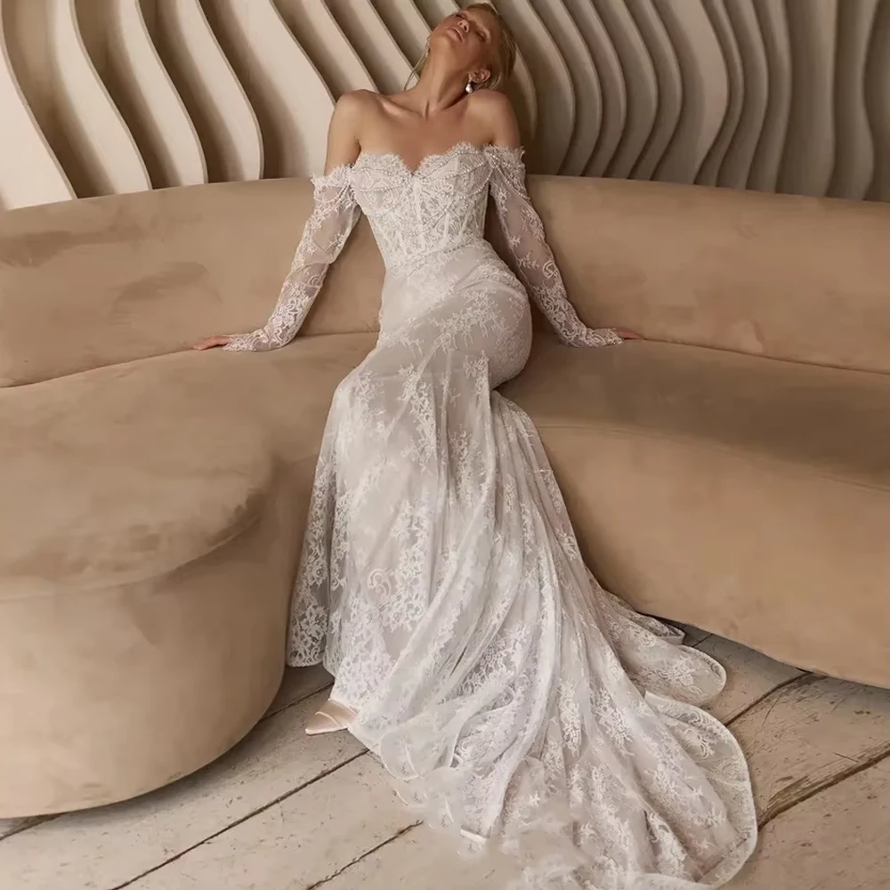 فساتين زفاف مثيرة مخصصة من الدانتيل حورية البحر للنساء لؤلؤ على شكل قلب ورقبة على شكل قلب وأكمام طويلة فستان زفاف فيستدوس فستان زفاف