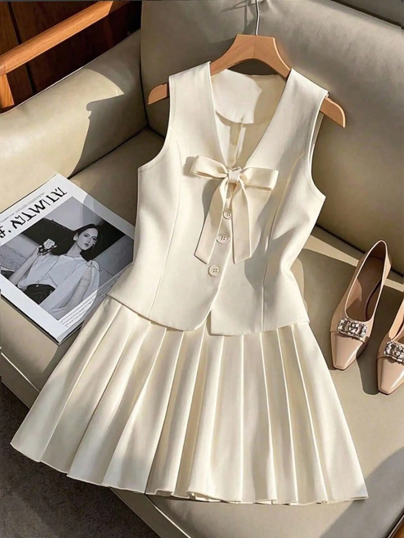 Elegant Cream Sleeveless Blazer Top with Bowknot + Pleated Skirt 2-Piece Set