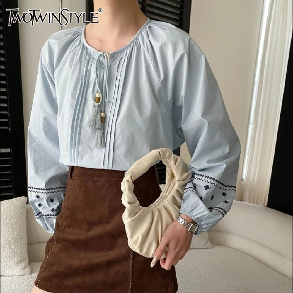 

TWOTWINSTYLE Solid Spliced Lace Up French Shirt Female O Neck Long Sleeve Loose Vacation Vintage Women's Shirts Autumn Fashion