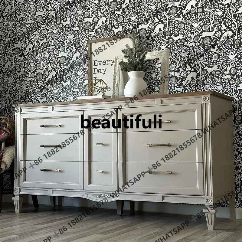 

French contrast carved small apartment home living room TV next to high chest of drawers American retro H