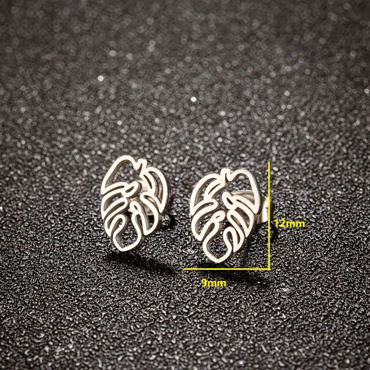 Spring stainless steel hollow palm tree leaf stud earrings small fresh Mori girls versatile temperament earrings wholesale