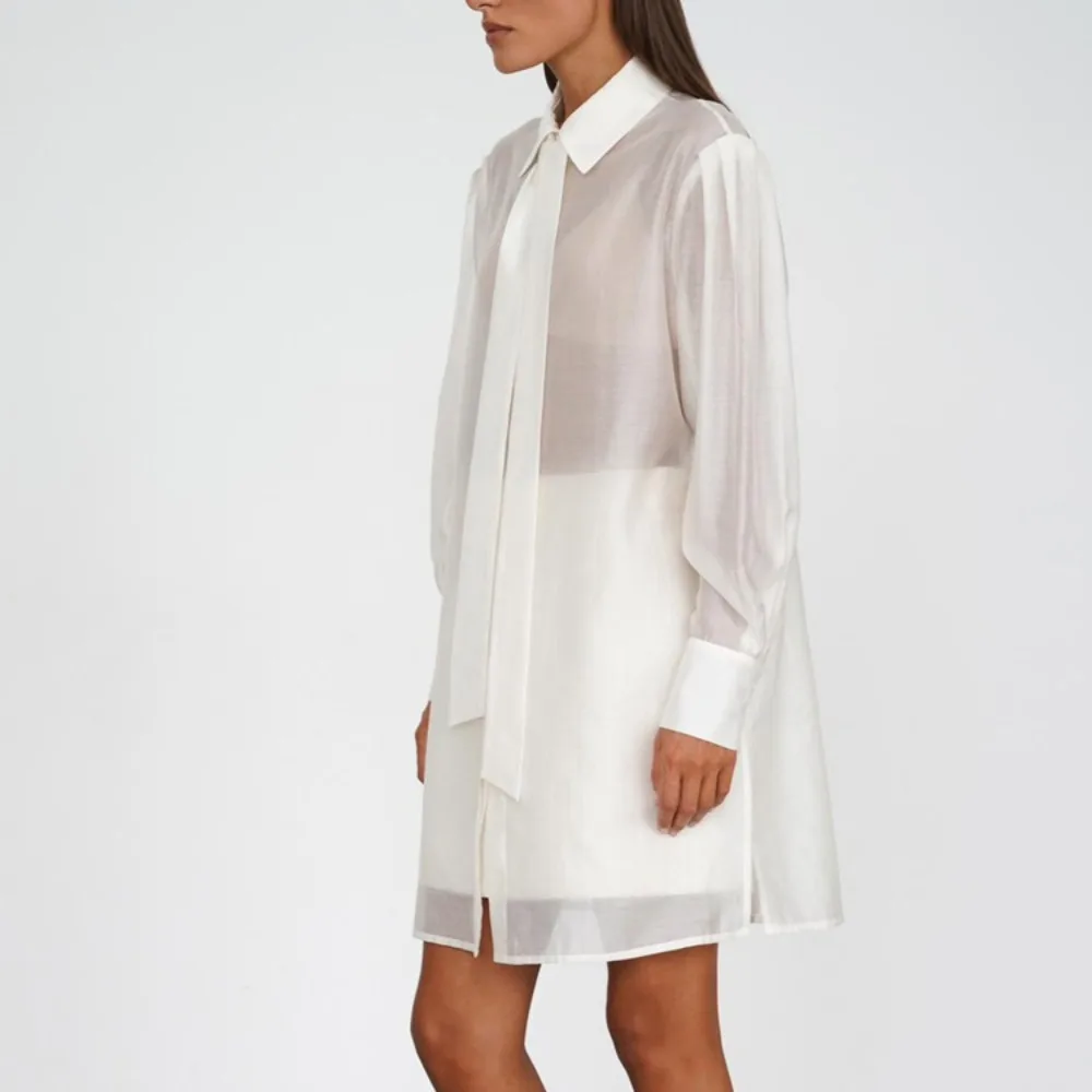 TWOTWINSTYLE Solid Spliced Lace Up Blouses voor Vrouwen Revers Lange Mouw Hoge Taille Minimal;ist Shirts Vrouwelijke Nieuwe