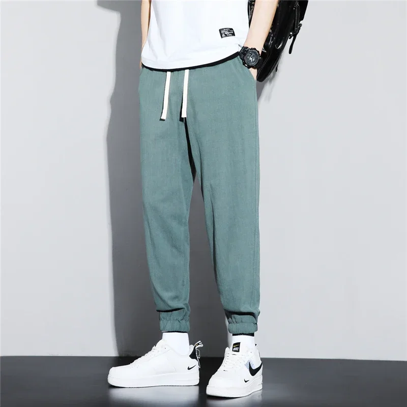 メンズコットンリネンパンツ男性秋の新通気性無地リネンズボン弾性ウエストストリートストレートパンツ男性
