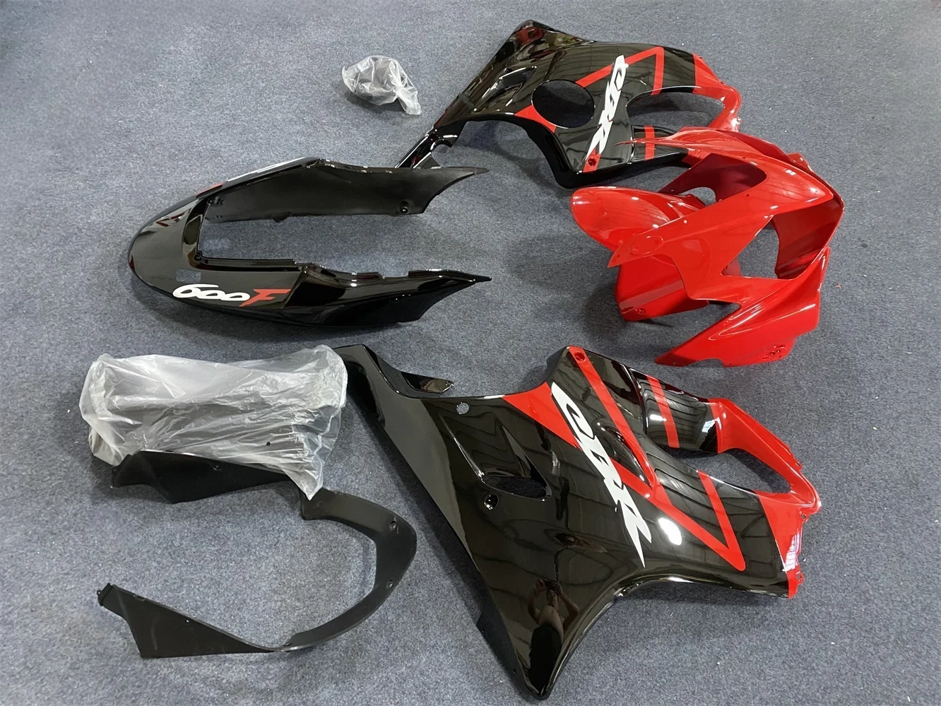 The motorcycle fairing is suitable for the CBR600F 2004 2005 2006 2007 CBR600 F4I 04 05 06 07 body fairing with red and black