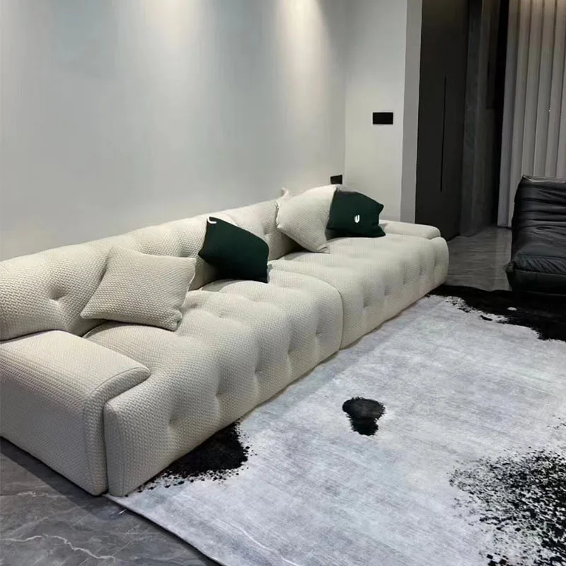 minimalist living room small apartment straight row black fabric sofa