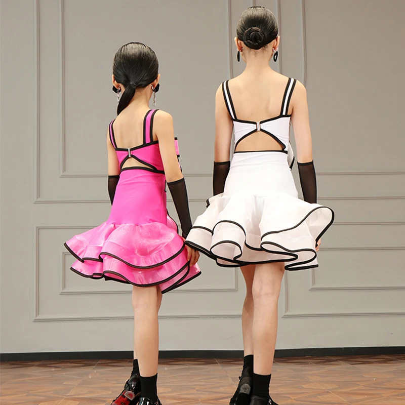 2025 Nuove Ragazze Costume di Ballo Latino Rosa Bianco Arco Top Gonna Performance Set Bambini Cha Cha Rumba Concorso di Ballo Vestito DNV22280
