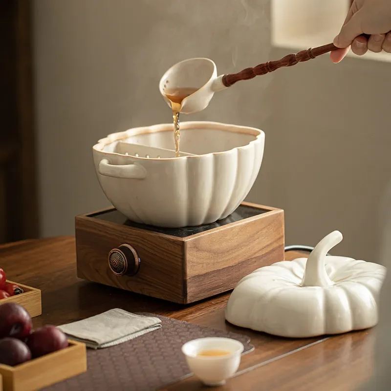 Ancient pumpkin pot health tea brewer with lid ceramic jar soda glaze white tea brewing tea bowl surrounding furnace roasting