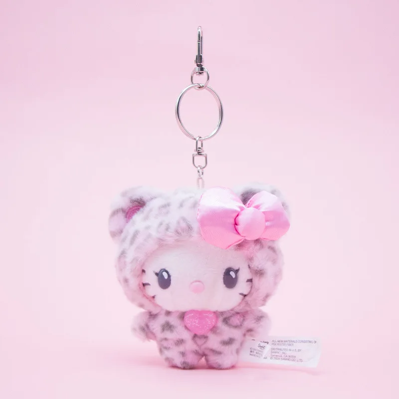 Miniso sanrio olá kitty boneca de pelúcia saco ornamentos rosa e amarelo latte pele escura saia leopardo padrão chaveiro bonito arco-nó