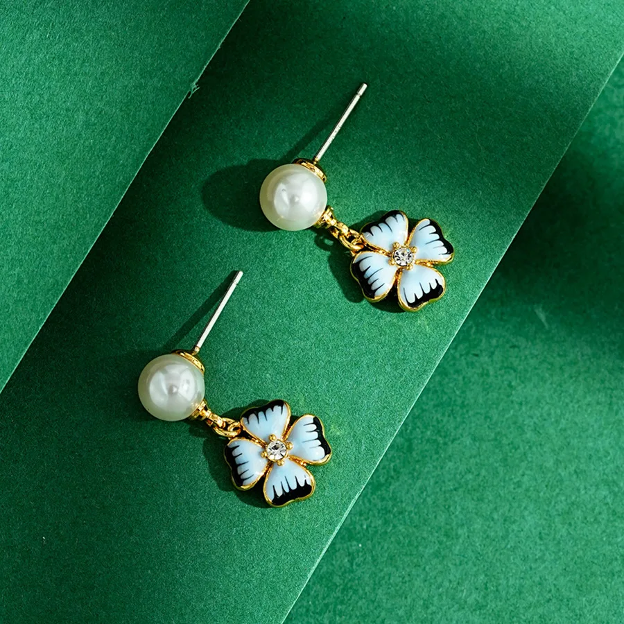 

Fashion Design Blue Enamel Glaze White Pearl Flower Earrings Sweet Temperament 925 Sterling Silver Needle Earrings for Women