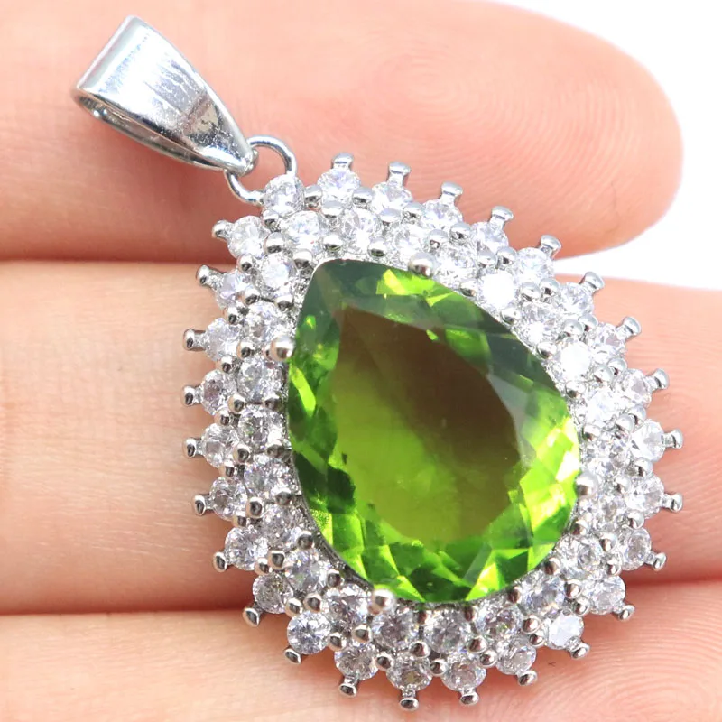 

Buy 3 Get 1 Free 35x22mm Big Drop Green Peridot Fire Rainbow Mystic Topaz Pink Kunzite White CZ Women Wedding Silver Pendant