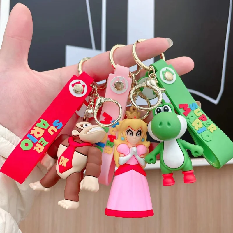 سوبر ماريو ثلاثية الأبعاد سلسلة مفاتيح من الكرتون ماريو بروس لويجي العلجوم يوشي العربة عمل نموذج لجسم بولي كلوريد الفينيل حقيبة بنقوش كرتونية دمية قلادة اللعب الهدايا
