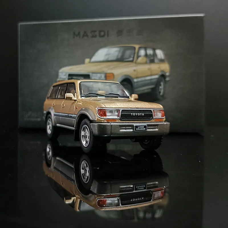 In stock: 1:64 1994 model of Land Cruiser LC80 gold alloy high-end simulation car model creative decorative item, festival gift