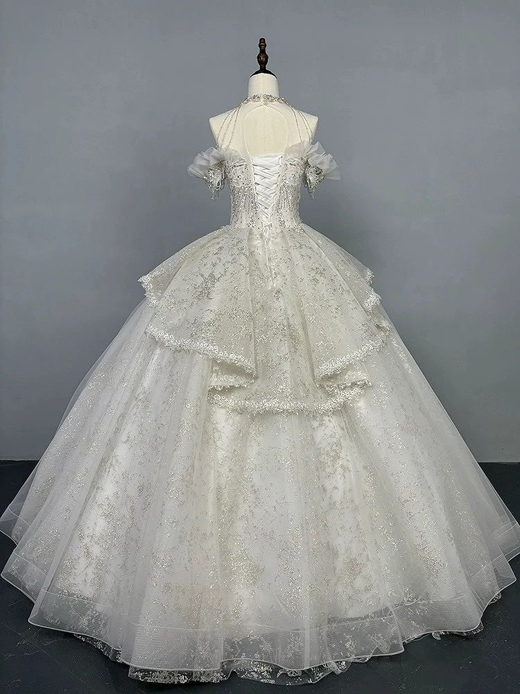 Vestidos de novia de lujo de princesa con cuello Halter, vestidos de novia sexys con cuentas brillantes, lentejuelas, cordones escalonados, corte sin espalda, 2024