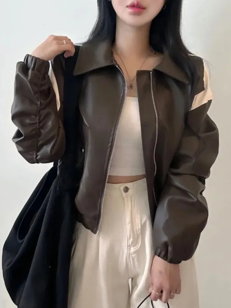 シックな秋のジッパーカラー、オートバイ風レザージャケット、長袖、コントラストカラーの切り替え、レディースファッション