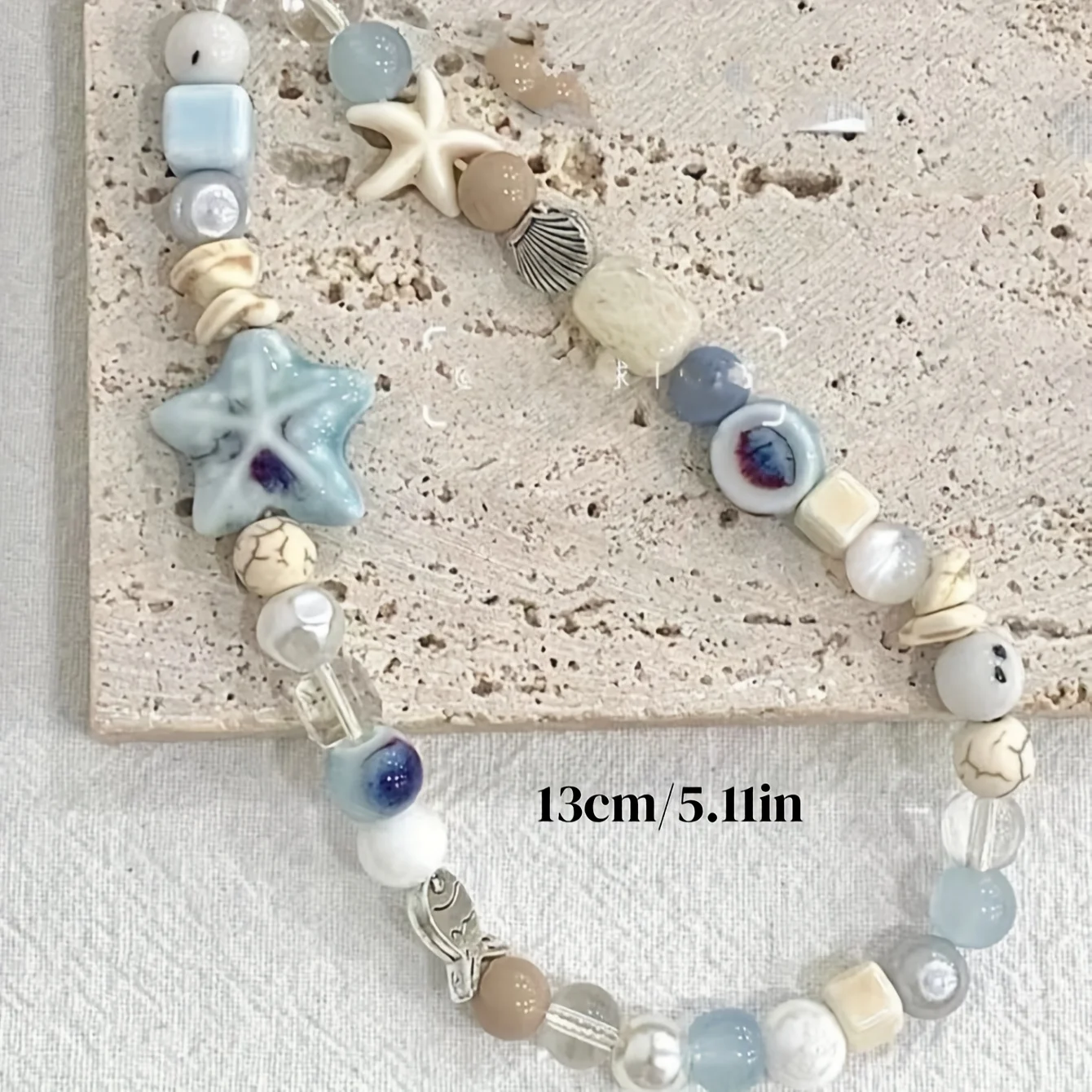 

Beaded phone strap, comes with a camera, suitable as a gift for mom, family, and as a phone accessory, phone lanyard