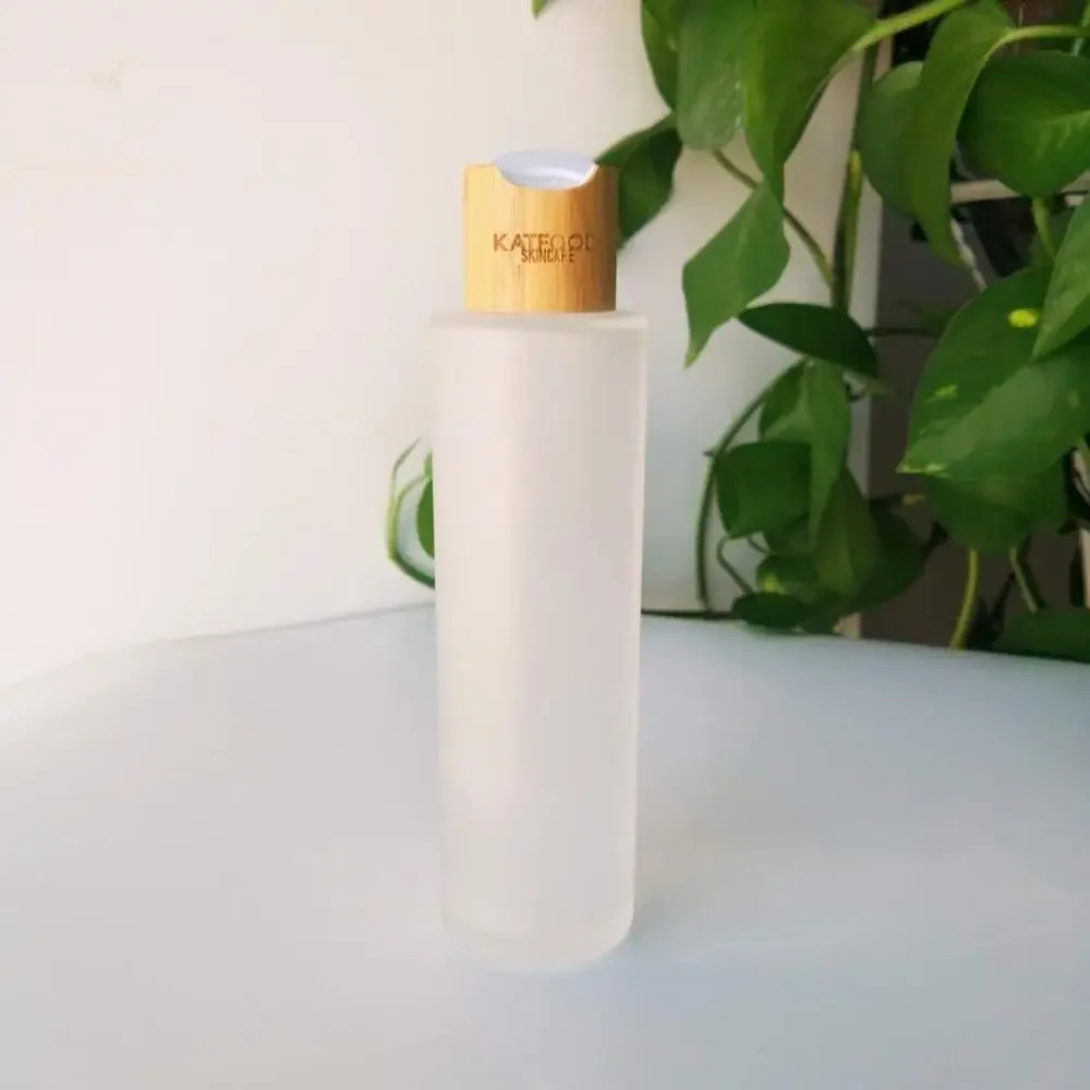 

wooden bamboo Glass Toner bottle Frosted Glass Pump Bottles with Bamboo Wood Lid Lotion Shampoo Pump Cap jars for cosmetics