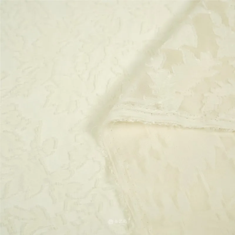 Exquisite and elegant cream-colored embossed jacquard cut fabric dress Hanfu pants designer