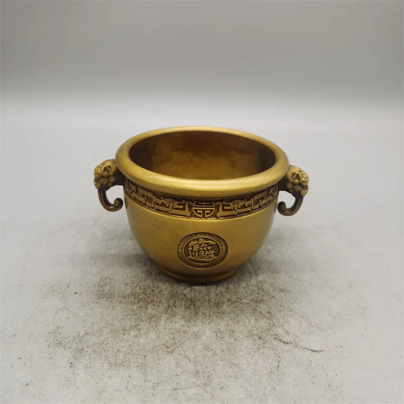 

Двухуширенный цилиндрический декоративный элемент из латуни с гладкой поверхностью