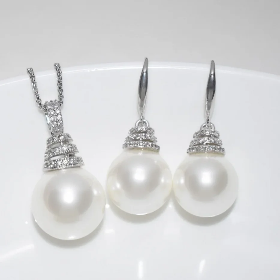 

Очаровательный кулон с белым жемчугом Южного моря + серьги и жемчуг 11-12 мм и 9999