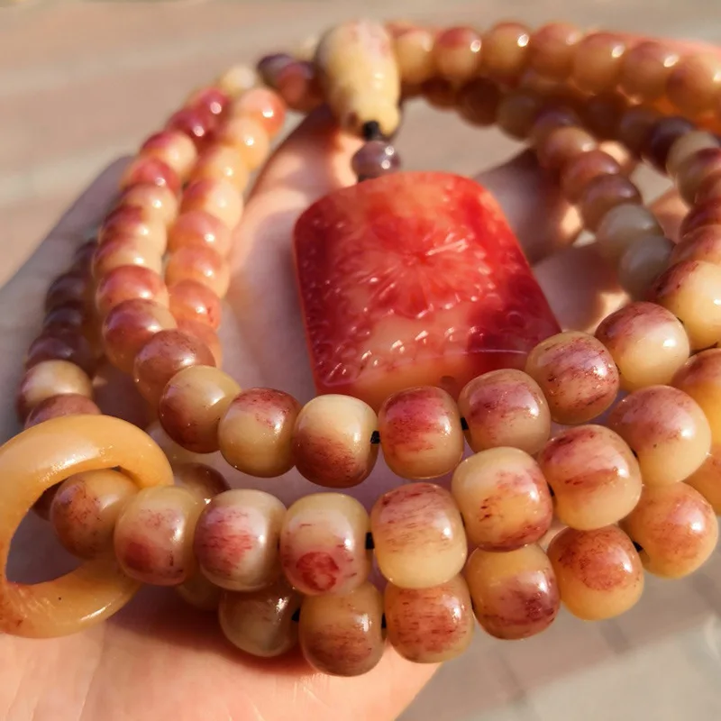 Full- cow and half-bleed camel bone jewelry featuring a running ring design in an ethnic style with animal carvings