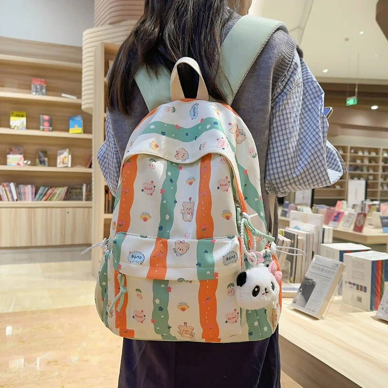 جديد لطيف الكرتون على ظهره المرأة سعة كبيرة حقيبة مدرسية موضة طباعة حقائب الظهر مريحة ومتعددة الاستخدامات الملمس حقيبة المدرب