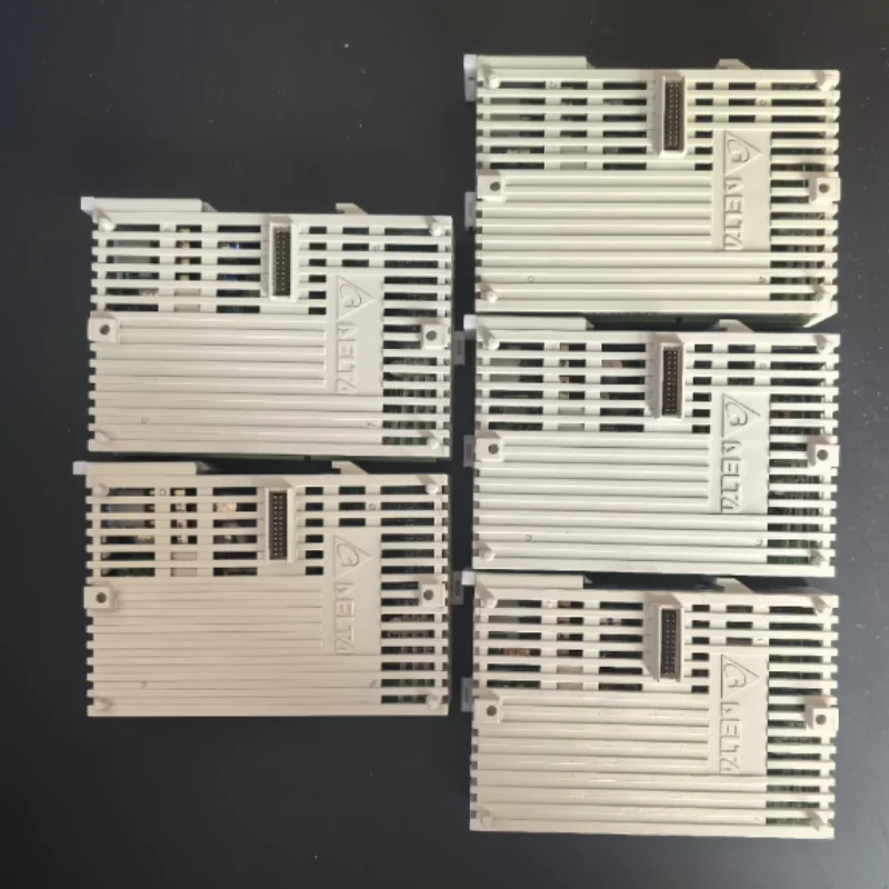 Modulo di seconda mano DVP04AD-S test OK in stock per consegna rapida