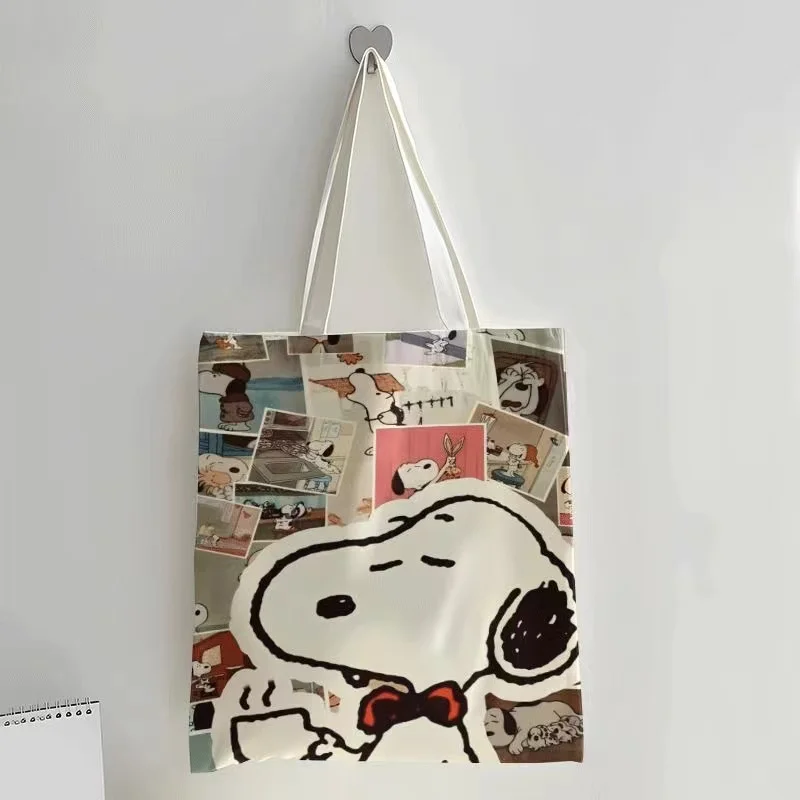 Snoopy Cartoon Druck muster Handtasche gut aussehende Frauen Männer Reiß verschluss Leinwand Tasche Einkaufstasche Jugend Umhängetasche Geschenk Großhandel