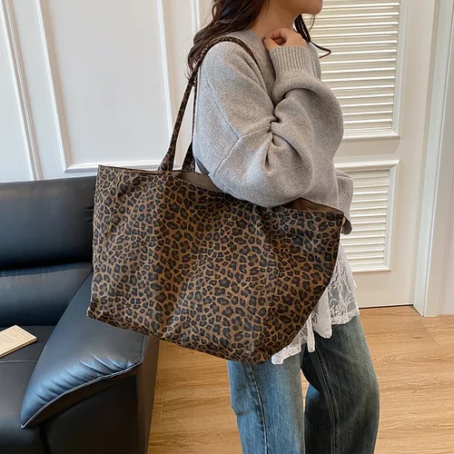 Imagen 2 del producto Bolso de mano con estampado de leopardo a la moda para mujer, bolso de hombro para ocio y desplazamientos, bolsa de almacenamiento de textura Simple grande, uso diario informal