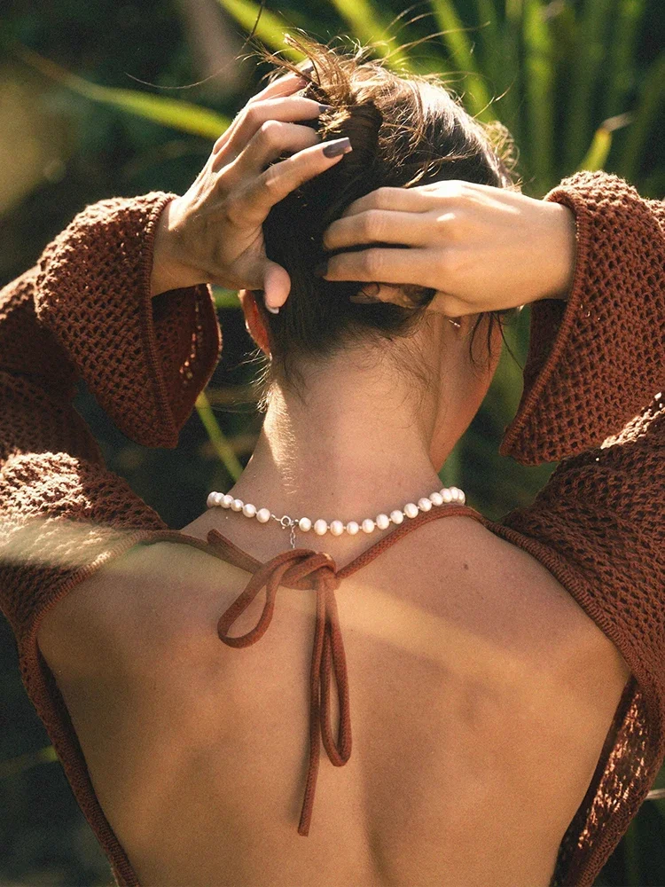Couleur unie col rond Crochet manches longues évasées dos nu cravate découpé 2025 femmes été vêtements de plage tricot Mini robes K169