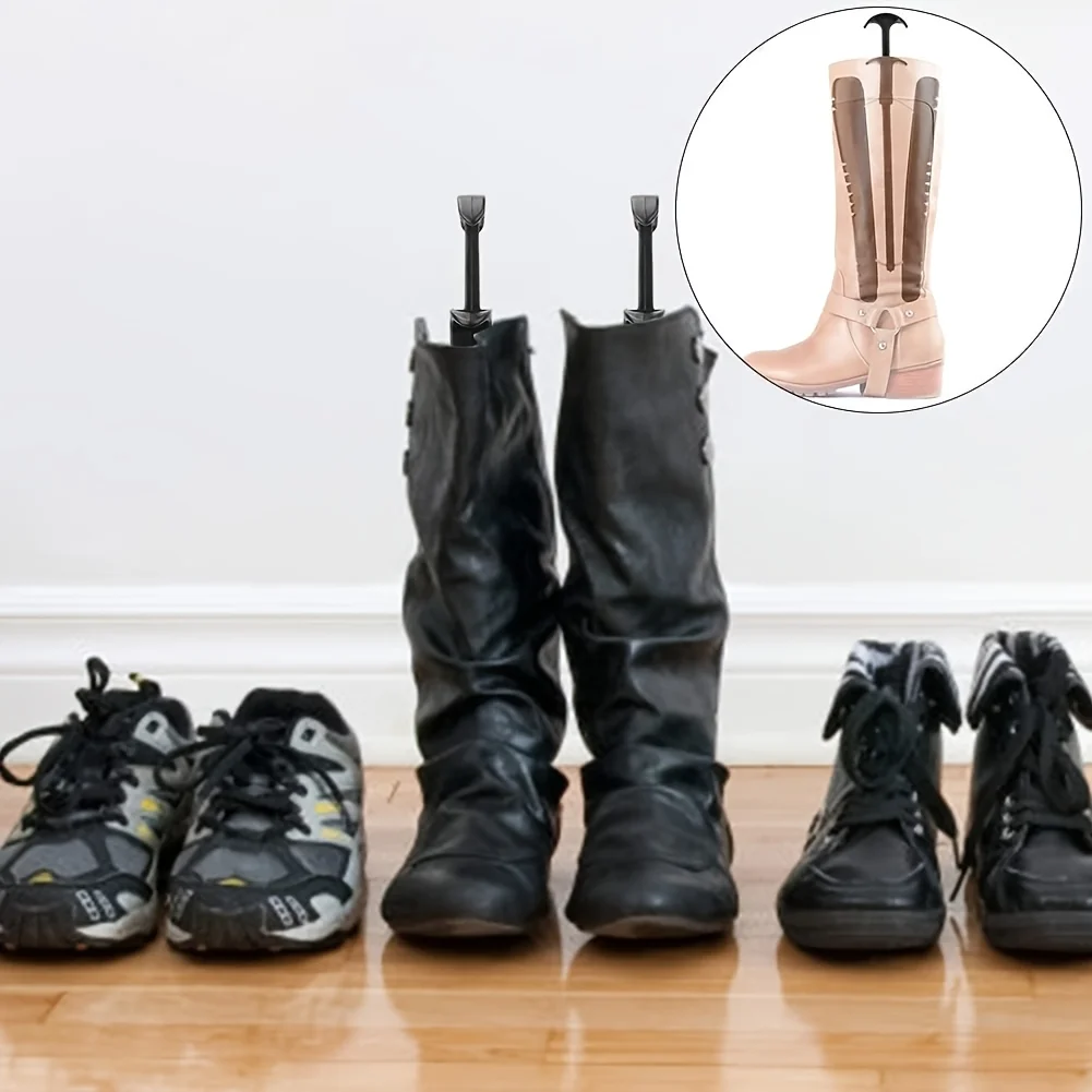 A pair of boot shapers/shoe trees, boot shape retainers, boot liner shapers with handles, tall boot shapers/boot clips.
