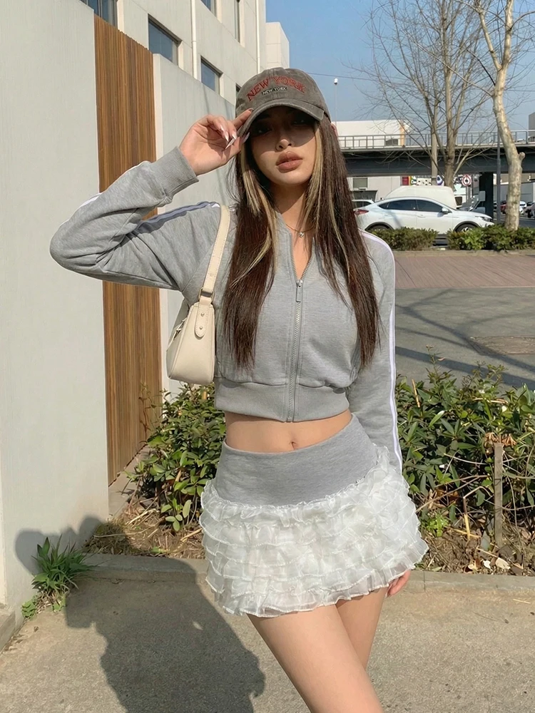 

Корейский стиль: Нежный и дерзкий комплект из укороченной толстовки на молнии и юбки с волнистым краем, женский, новинка ранней весны 2026 года