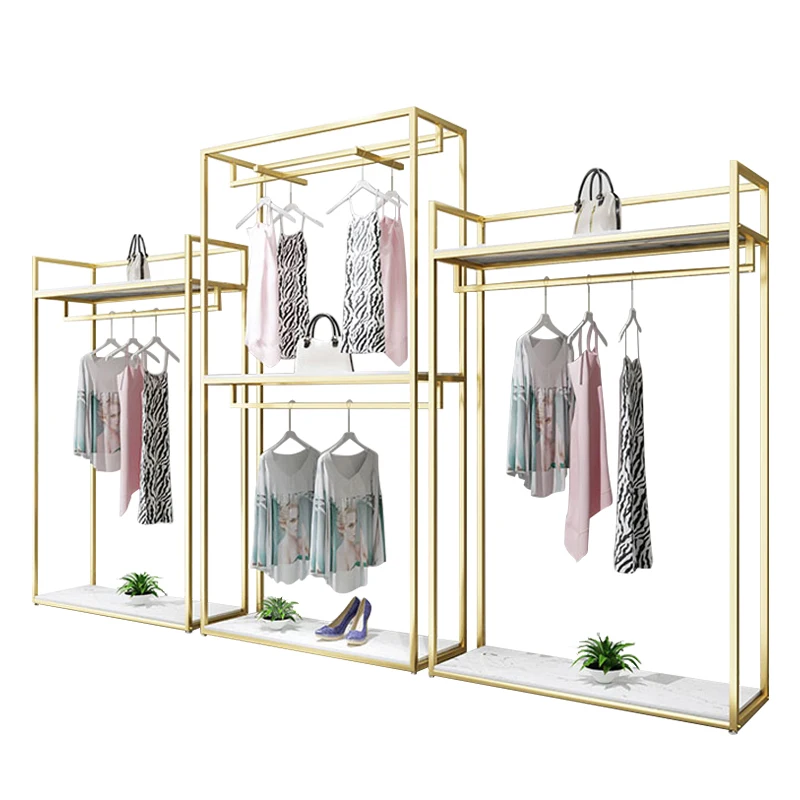 

custom.Custom Women Cloth Display Stand Stainless Steel Marble Pattern MDF Clothes Rack Metal Boutique Clothing Racks for S