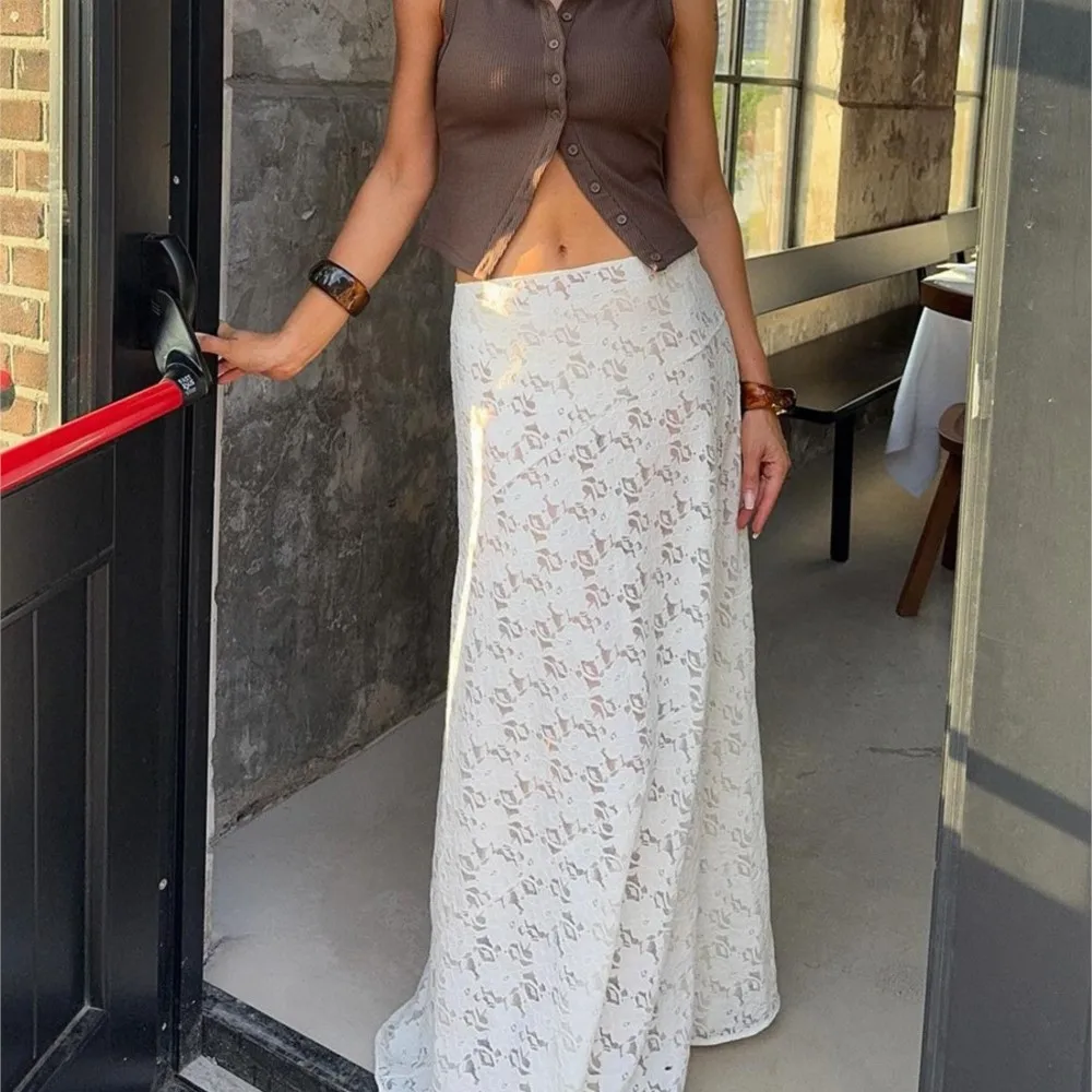 เสื้อผ้าผู้หญิง กระโปรงเอวต่ำแบบซีทรู ผ้าลูกไม้โปร่ง สีพื้น เรียบง่าย สไตล์เรียบหรู แมทช์ได้กับทุกชุด อินเทรนด์