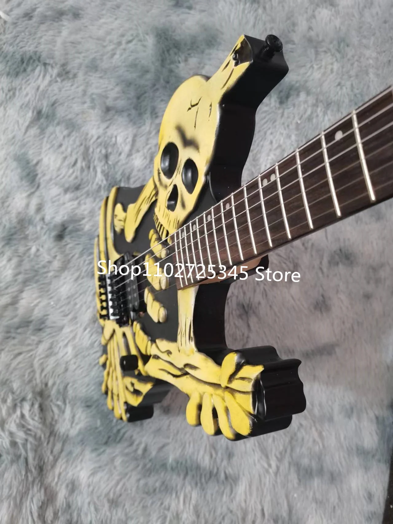 6-string skull electric guitar, maple fingerboard, silver accessories, tremolo system, free shipping