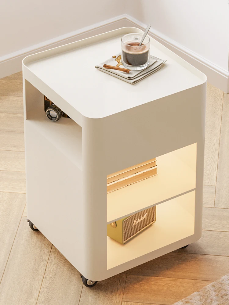 

Nordic modern simple movable wrought iron bedside table Small household bedroom wheeled bedside shelf luxury.
