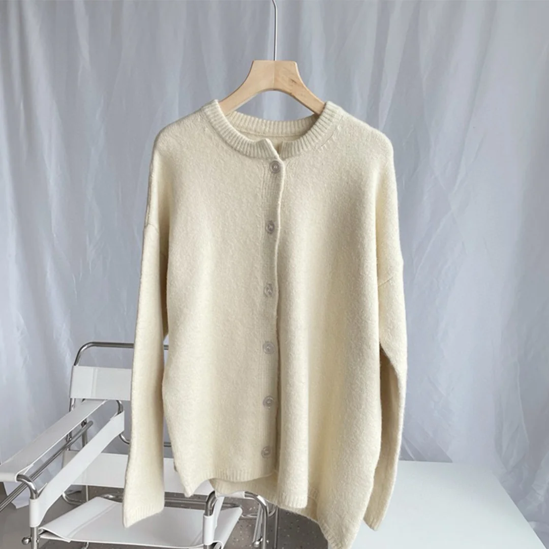 2025 outono/inverno moda suéter de manga comprida com gola assimétrica e bainha irregular para mulheres