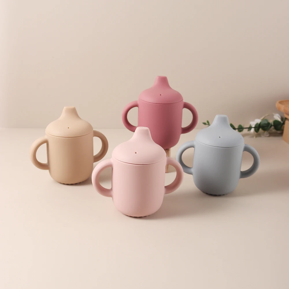 新しい固体 180 ミリリットルベビーシリコーンシッピーカップ BPA フリーポータブル給餌カップポータブル学習ハンドシャンク飲料水トレーニングカップ