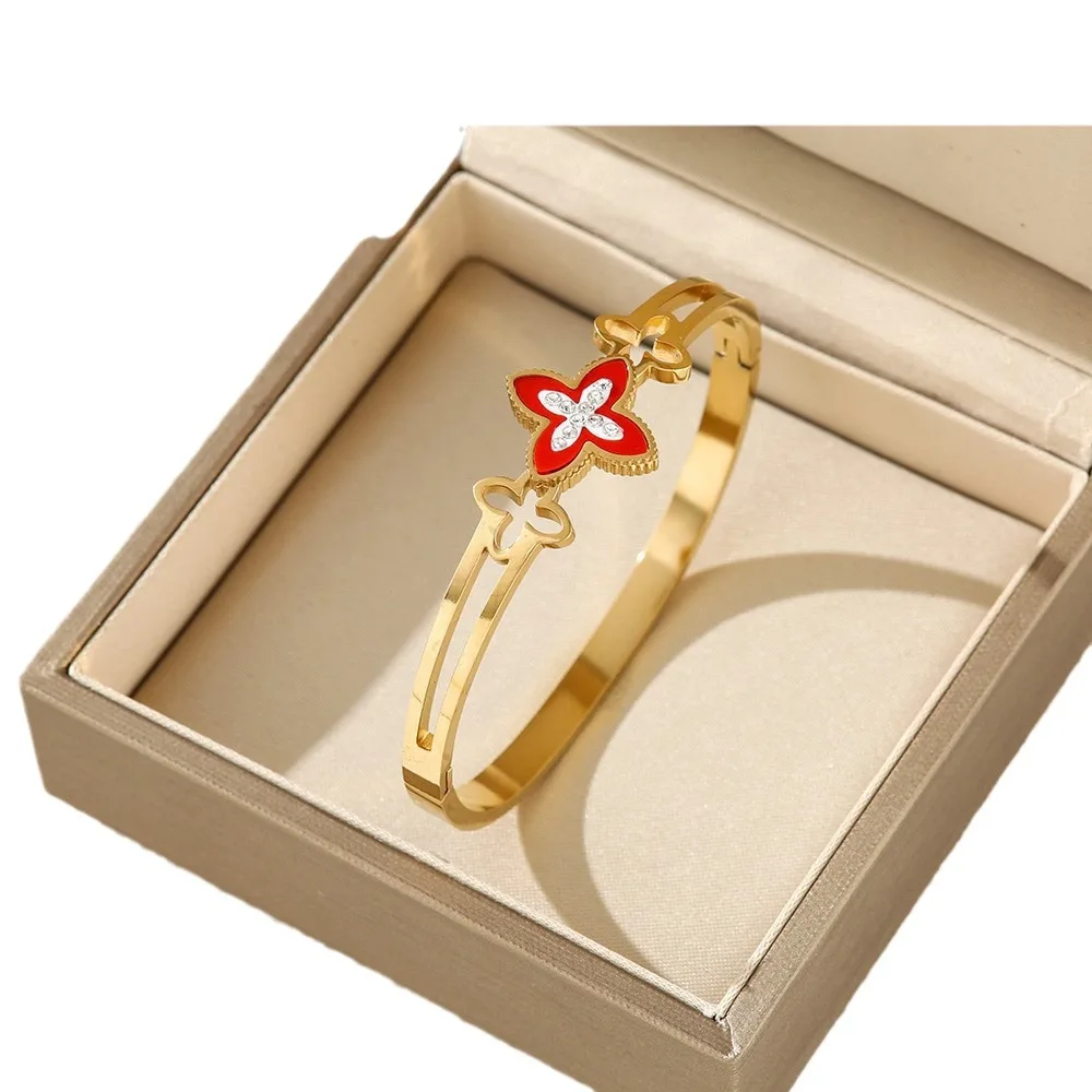 

Модный браслет с четырьмя листьями клевера, инкрустированный бриллиантами и полыми бриллиантами, браслет в стиле ретро специально разработанный для женщин.