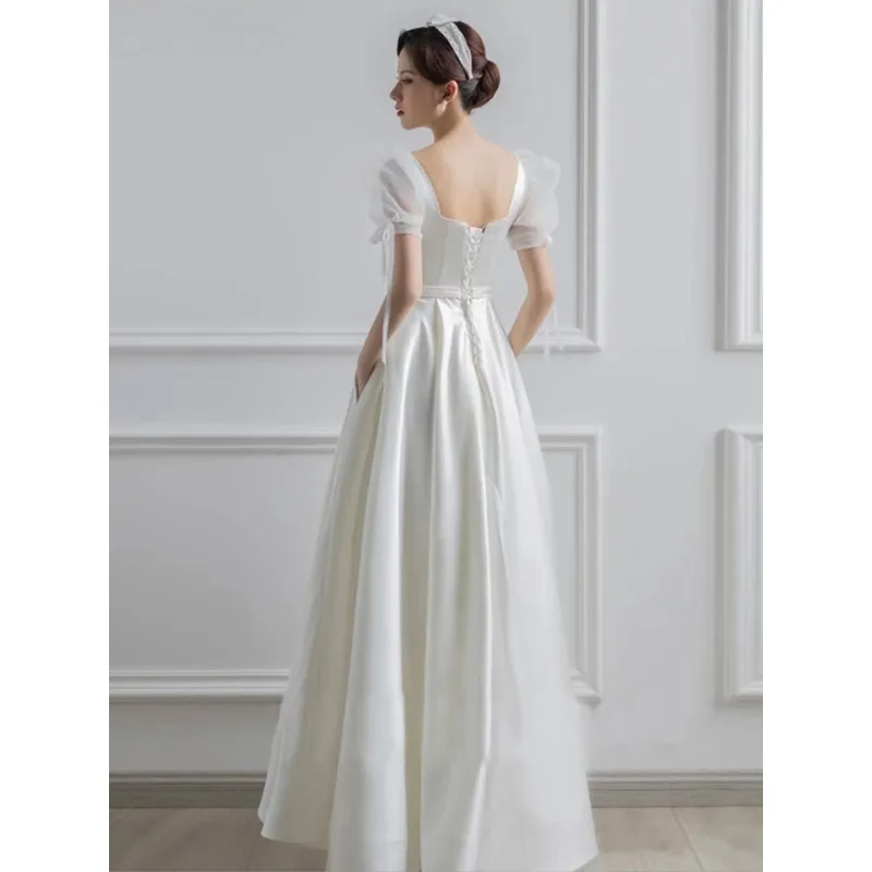 

White Light Wedding Dress Dignified Temperament Daily Satin Square Collar Bubble Sleeve Bow Pearl A-line Skirt Evening Dresses