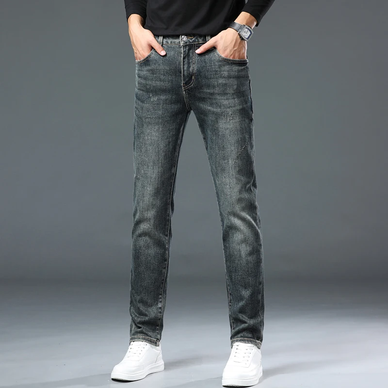 High-end fashion Slim straight jeans men\'s business stretch embroidery thick bottom denim pants