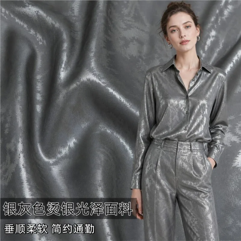 Smooth soft silver-embossed and lustrous fabric for shirts dresses trousers gowns costumes