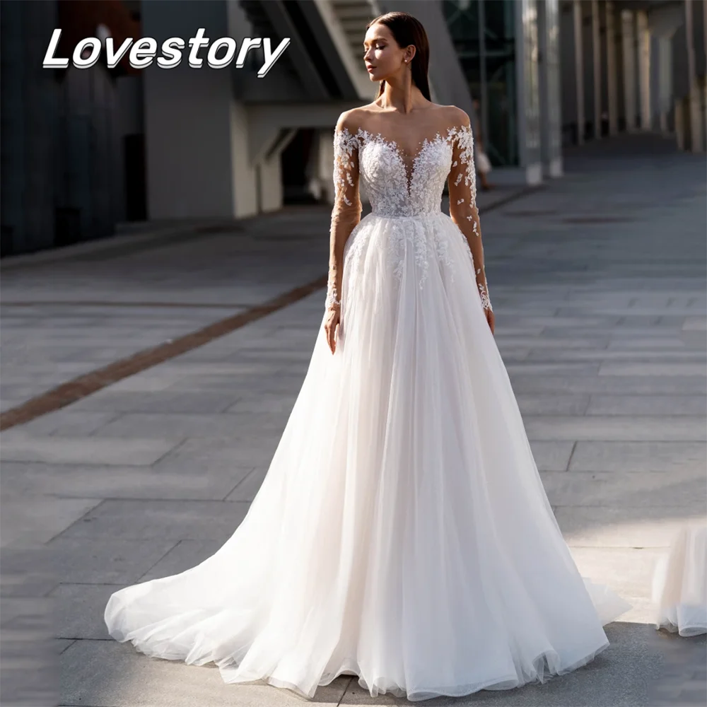 

Exquisite A-Line Wedding Dresses O-Neck Bride Robes Illusion Bridal Gown Long Sleeves Buttons Lace Appliques Vestidos De Noiva